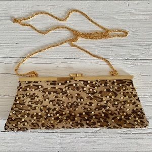 Sequined leopard clutch